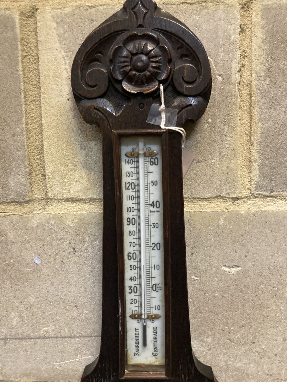 An Edwardian aneroid barometer and thermometer, height 86cm